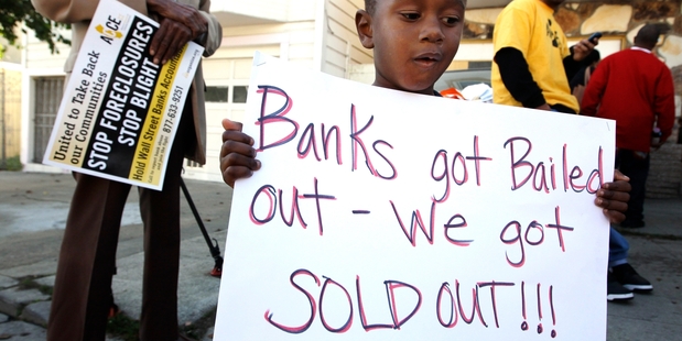 The rash of foreclosures in the US is unlikely to occur in NZ if the housing market crashes. Photo / AP