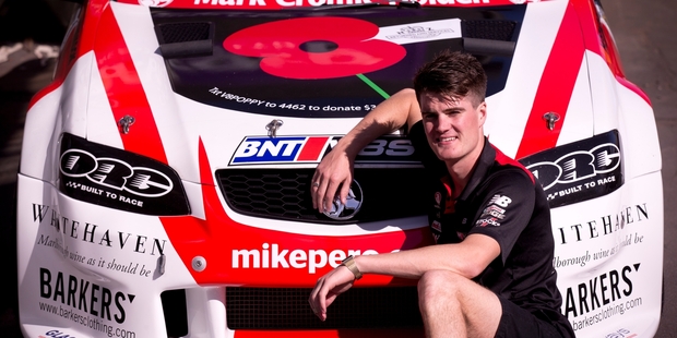 V8 race driver Richard Moore has had the Anzac poppy printed on his car. Photo / Dean Purcell.