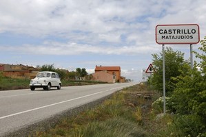 A car passes by the road sign at the entrance of the small Spanish town of Castrillo Matajudios, which means Castrillo Kill Jews in English, near Burgos. Photo / AFP
