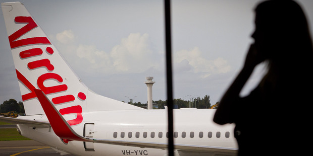 Virgin Airlines are denying media reports a flight from Brisbane has been hijacked and forced to land in Bali. Photo / AP