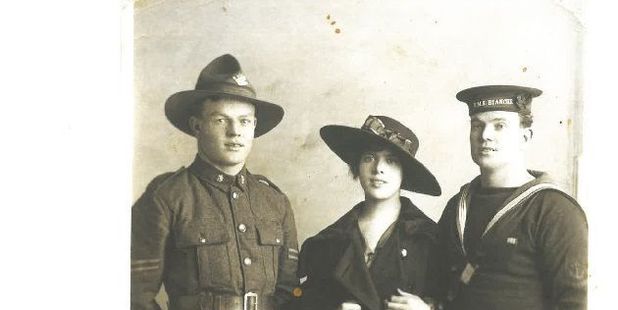 Fred Arnold (right) and William Arnold with William's wife Ivy.