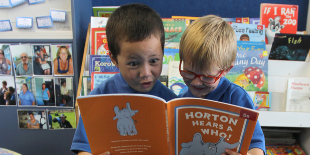 New entrants Wharepohue Bidois, left, and Aron Bain take part in a literacy programme at Merivale School,