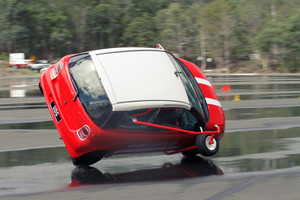 Attempts at completing a J-turn and a 360-degree spin on the wet tarmac at the Ultimate Stunt Driving school near Queensland's Gold Coast.
Minis are the real stars on the private roads at the Ultimate Stunt Driving school in Queensland.