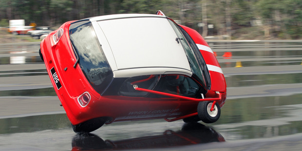 Attempts at completing a J-turn and a 360-degree spin on the wet tarmac at the Ultimate Stunt Driving school near Queensland's Gold Coast.
Minis are the real stars on the private roads at the Ultimate Stunt Driving school in Queensland.