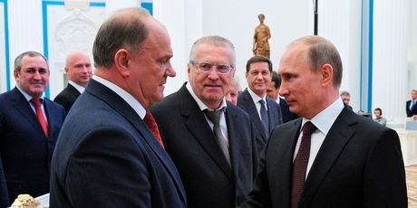Vladimir Zhironovsky, centre, with Russian President Vladimir Putin, right, and Communist party leader Gennady Zyuganov. Photo / AP