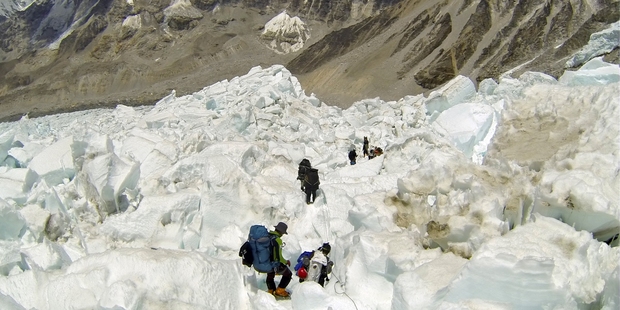 Climbers descend Khumbu Icefall on their way back to Base Camo on Mount Everest. Photo / AP
