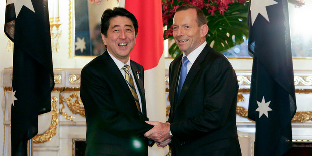 Japan's PM Shinzo Abe and Tony Abbott have concluded a trade deal that some purists have poured scorn on. Photo / AP