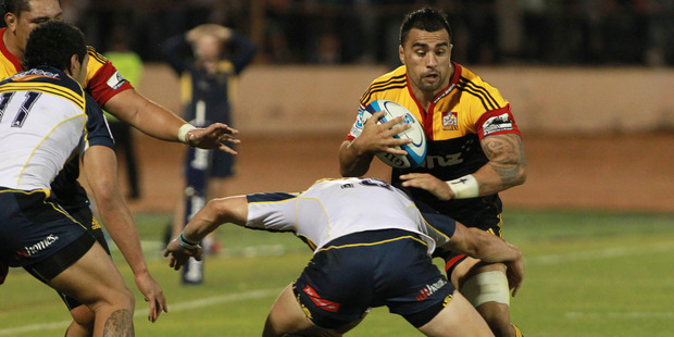 Liam Messam of the Chiefs looks for a way around Brumbies' Andrew Smith in a previous Chiefs vs. Brumbies clash.