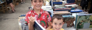 Ruben, 9, and Marcus, 5, Barrow scoured the tables of books for bargains at the Tauranga Rotary Club's 27th Annual Easter Book Sale. Photo/Andrew Warner