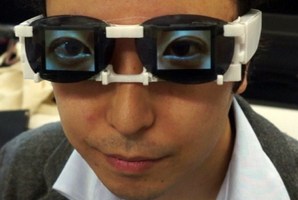 Hirotaka Osawa shows the AgencyGlass, a device to project emotions.
Photo / AFP