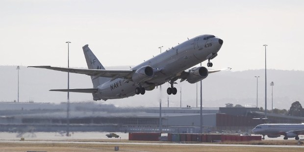 April 17 photo of US Navy P8 Poseidon taking off from Perth International Airport en route to the search for MH370. Photo / AFP