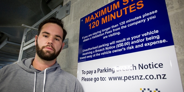 David Wilson was asked to pay $65 despite signs in the Auckland carpark where his car broke down saying fines are $50. Photo / Sarah Ivey