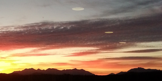 The airport staff member took the sunrise shots outside.