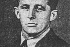 Flight Sergeant Gerald "Rocky" Roche and the stone memorial to the dead airmen erected in Heythuysen, the Netherlands.