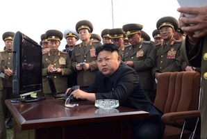 North Korean leader Kim Jong-Un (C). Photo / AFP