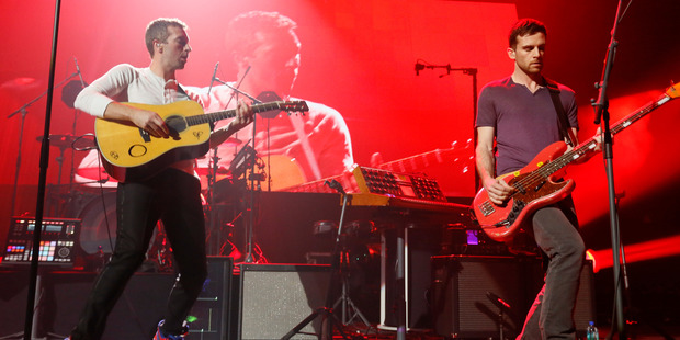 Coldplay have hidden handwritten lyrics in libraries around the world. Photo/AP.
