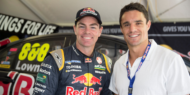 V8 Supercars Championship leader Craig Lowndes and Dan Carter at Pukekohe yesterday. Photo / Mark Horsborough