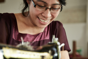 Ibu Gusti, a seamstress at Komang's Bali workshop. Photo / Dan Max. Styling / Laura Blade