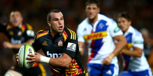 Tom Marshall of the Chiefs runs the ball during the round five Super Rugby match between the Chiefs and the Stormers at Waikato Stadium. Photo / Getty Images.