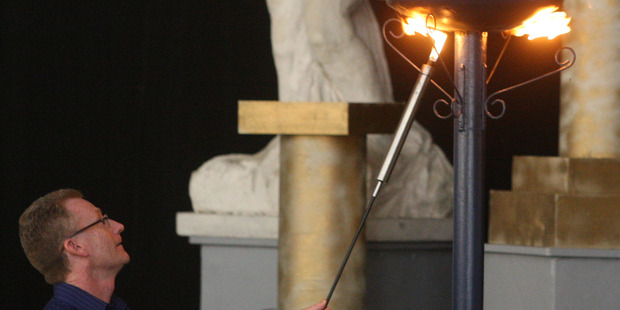 Games manager Mike Cronin lights the torch to open the 2013 NZ Masters Games. Photo/Bevan Conley