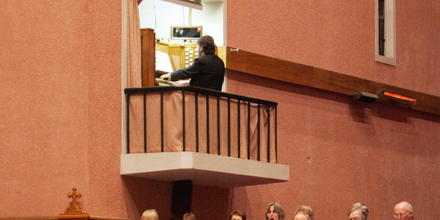 Organist John Wells.