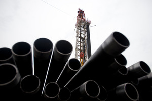 Threaded drilling pipes are stacked at a hydraulic fracturing site. Photo / Bloomberg