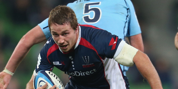 Scott Fuglistaller of the Rebels is tackled during the round 15 Super Rugby match between the Rebels and the Waratahs at AAMI Park. Photo / Getty Images.
