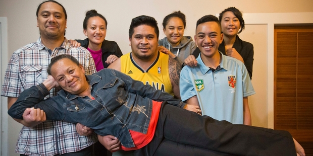 Rose Toki with six of her 10 children, Michael, 33, Dina, 23, Anam, 25, Tavai, 18, Allan, 15, and Megan, 14. Mrs Toki graduated and now works in early childhood learning. Photo / Greg Bowker