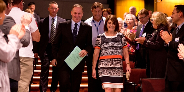 John Key arrives with his wife Bronagh at National's northern convention at Waipuna Hotel yesterday. Photo / Dean Purcell