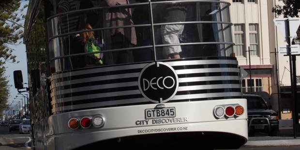 Passengers enjoy their last ride on the Deco City Discoverer bus service yesterday. Photo/Paul Taylor