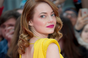Emma Stone arrives says keeping weight on 'is a struggle' sometimes. Photo/AP