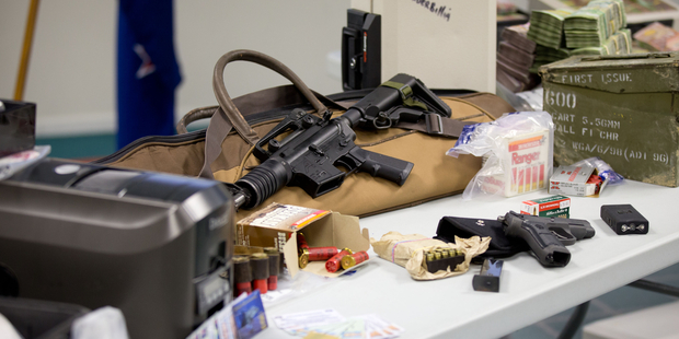 Items seized during Operation Genoa were worth more than $3 million in assets and included a Ferrari, Porsche and Maserati. Photo / Richard Robinson