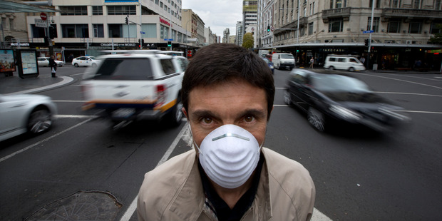 Air pollution at the intersection of Queen St and Customs St in central Auckland may breach World Health Organisation standards. Photo / Brett Phibbs