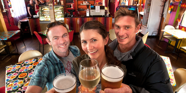 Celebrating the changing of the guard at Abracadabra are, from left, departing owner Brendon Arkwright and new owners Nadia Glyn Goldbert and Justin Kala Genest. Photo / Ben Fraser