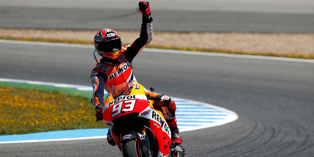 MotoGP raider Marc Marquez of Spain celebrates his victory after wining the Spain's Motorcycle Grand Prix at the Jerez race track in southern Spain. Photo / AP