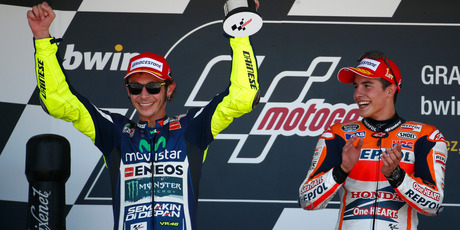 Valentino Rossi of Italy, left, celebrates his second position next to Marc Marquez of Spain, on the podium of the Spainish Motorcycle Grand Prix. Photo / AP