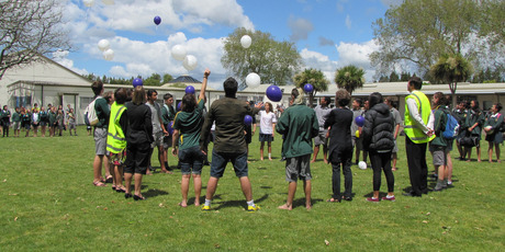 Balloons filled with helium were set free at Katikati College as a tribute to 16-year-old Ricky Pettigrew shortly after his death.