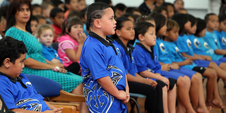 Carlos Henare, Year 3, welcomes Prime Minister John Key and other dignitaries to the launch of Northpower's UFB network at the school yesterday. Photo / John Stone