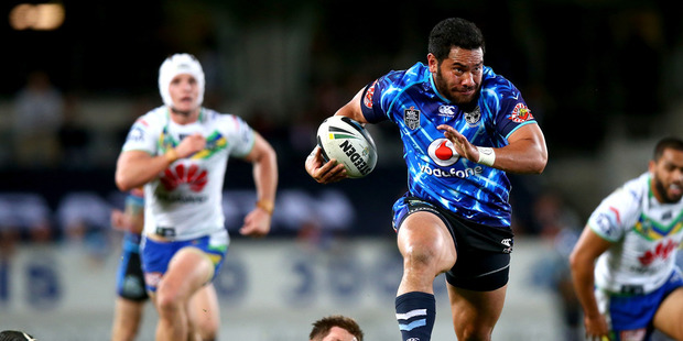 Konrad Hurrell of the Warriors breaks through the Raiders defence during the round nine NRL match between the New Zealand Warriors and the Canberra Raiders. Photo / Getty Images.