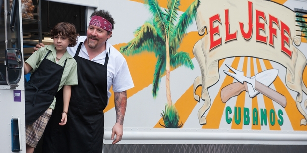 Emjay Anthony, left, and Jon Favreau in a scene from Chef.