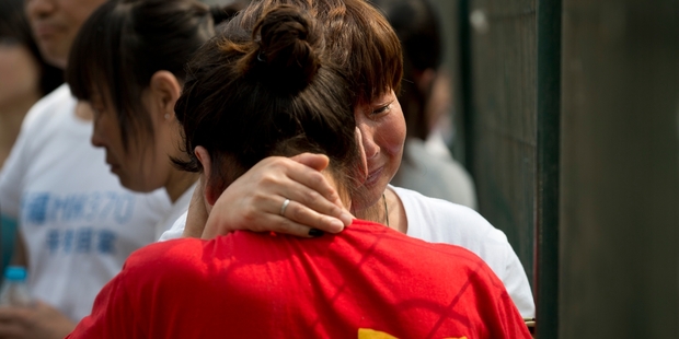 Relatives of those on the missing plane have had no comfort after searches have so far failed to come up with a single piece of debris. Photo / AP