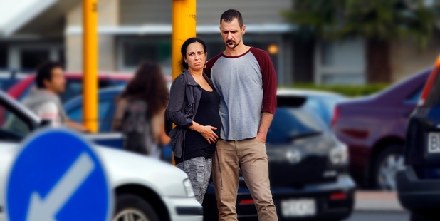 Nathan Watson and his pregnant partner Jasmine Douglas at 15th Avenue and Fraser St intersection where he says he was a victim of a hit-and-run on Monday night.PHOTOS/GEORGE NOVAK