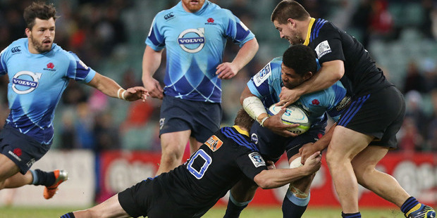 Tatafu Polota Nau of the Waratahs is tackled during the round 12 Super Rugby match between the Waratahs and the Hurricanes. Photo / Getty Images