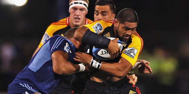 Michael Fitzgerald on a charge for the Chiefs in a match against the Blues last season. Photo / Getty