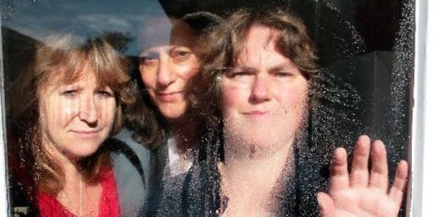 Labour politicians Clare Curran (left) and Poto Williams check out the damp, mouldy state house occupied by Tainui woman Karen Barnett (right). Photo / Dan Hutchinson.