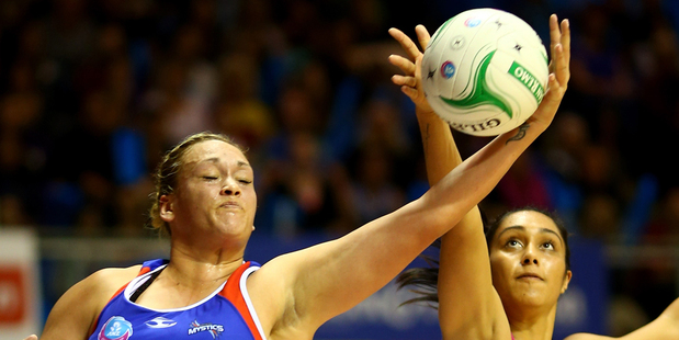 Catherine Latu of the Mystics gets to the ball ahead of Phoenix Karaka of the Steel. Photo / Getty Images