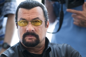 Steven Seagal is considering a shot at Arizona's highest office and has discussed it with Arpaio. Photo / AP