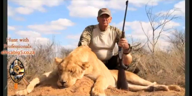 Former marine R. Lee Ermey with the lion he shot.