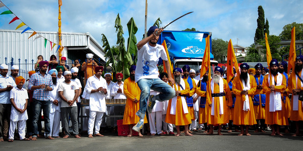 A swordsman performing the ancient Indian martial art of Gatka during the inaugural Tauranga Sikh Parade held on Saturday. Photo/Ruth Keber