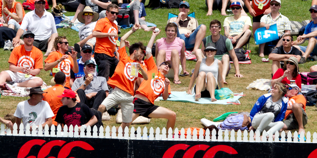 Michael Morton caught a six with one hand to win $100,000 from Tui at the Black Caps vs West Indies one day game at Seddon Park today. Photo / Christine Cornege